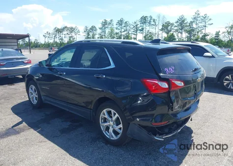 2018 Chevrolet Equinox Premier z USA, uszkodzony, nr VIN 2GNAXVEV7J6318103